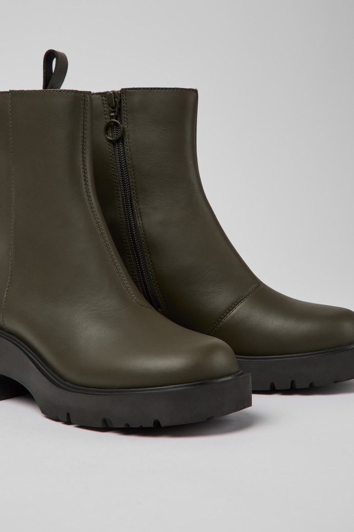 Close-up view of Milah Green leather zip boots for women