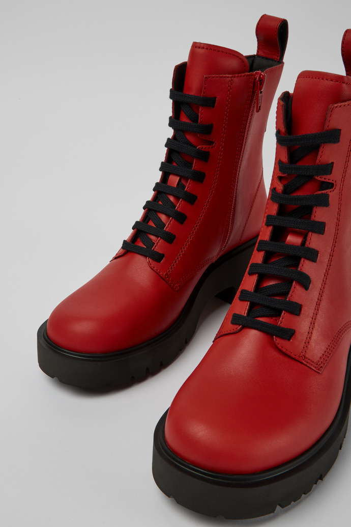 Close-up view of Milah Red lace-up boots for women