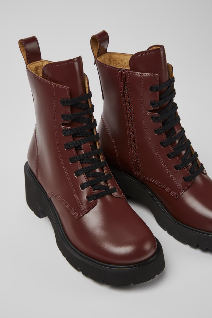 Close-up view of Milah Burgundy lace-up boots for women