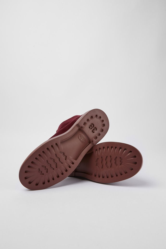 The soles of Poligono Burgundy velvet ankle boots for women