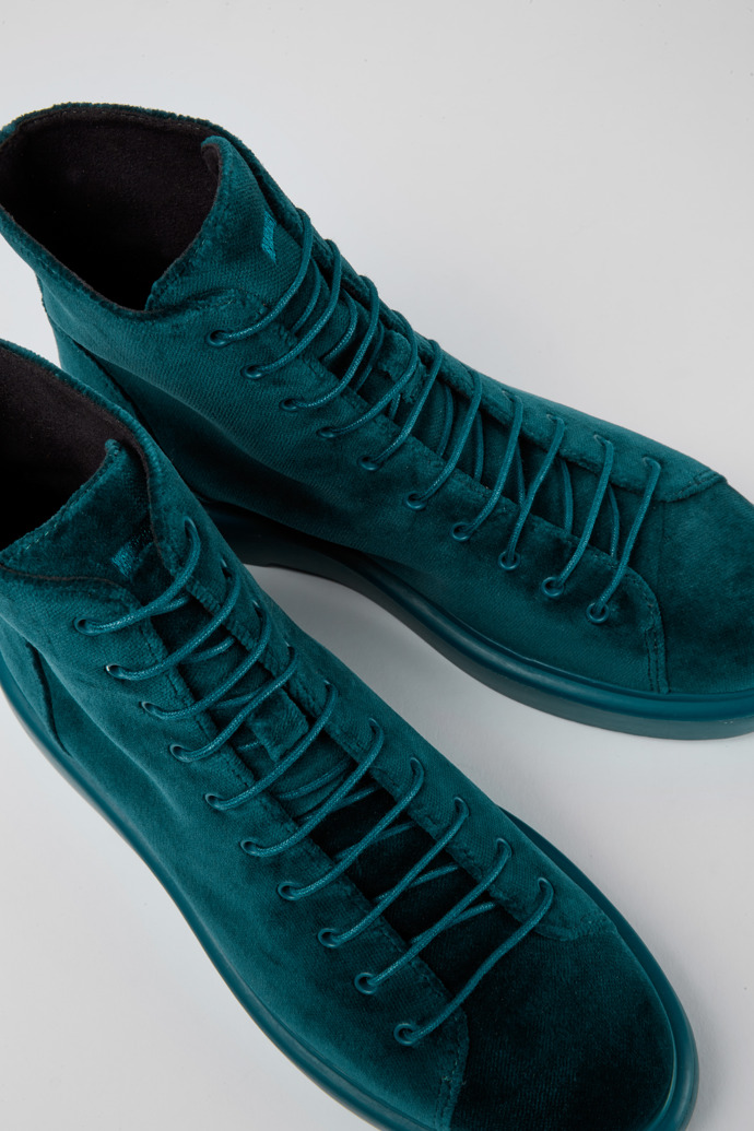 Close-up view of Poligono Green velvet ankle boots for women