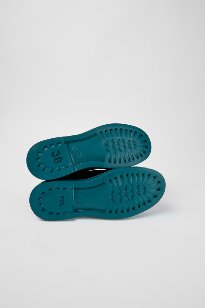 The soles of Poligono Green velvet ankle boots for women