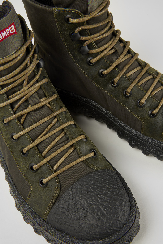 Close-up view of Ground Green ankle boots for women