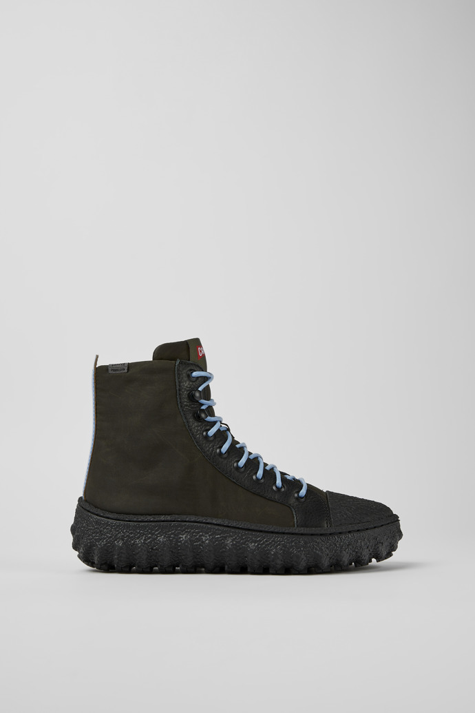 Image of Side view of Ground Dark green textile and leather ankle boots for women