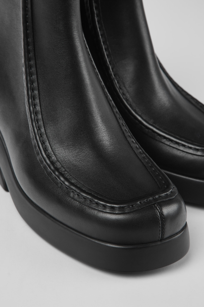 Close-up view of Kaah Black leather boots for women