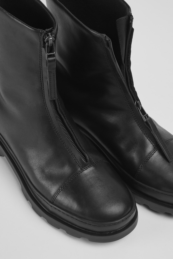 Close-up view of Brutus Black zip boots