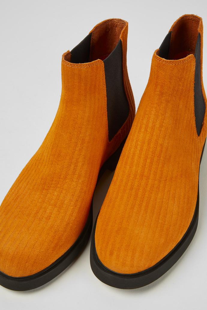 Close-up view of Iman Orange nubuck ankle boots