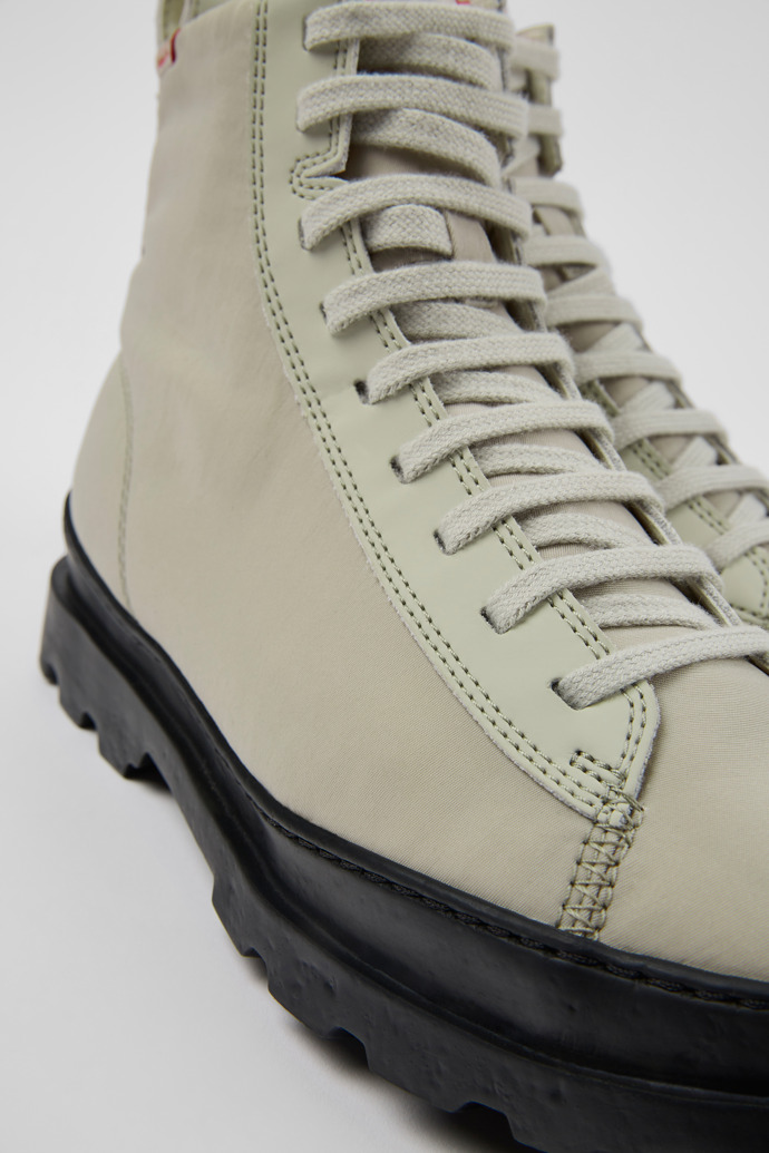 Close-up view of Brutus Gray lace-up boots for women