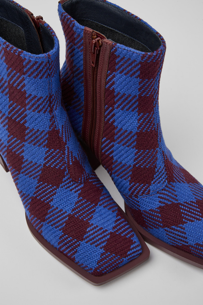 Close-up view of Karole Blue and burgundy cotton boots for women