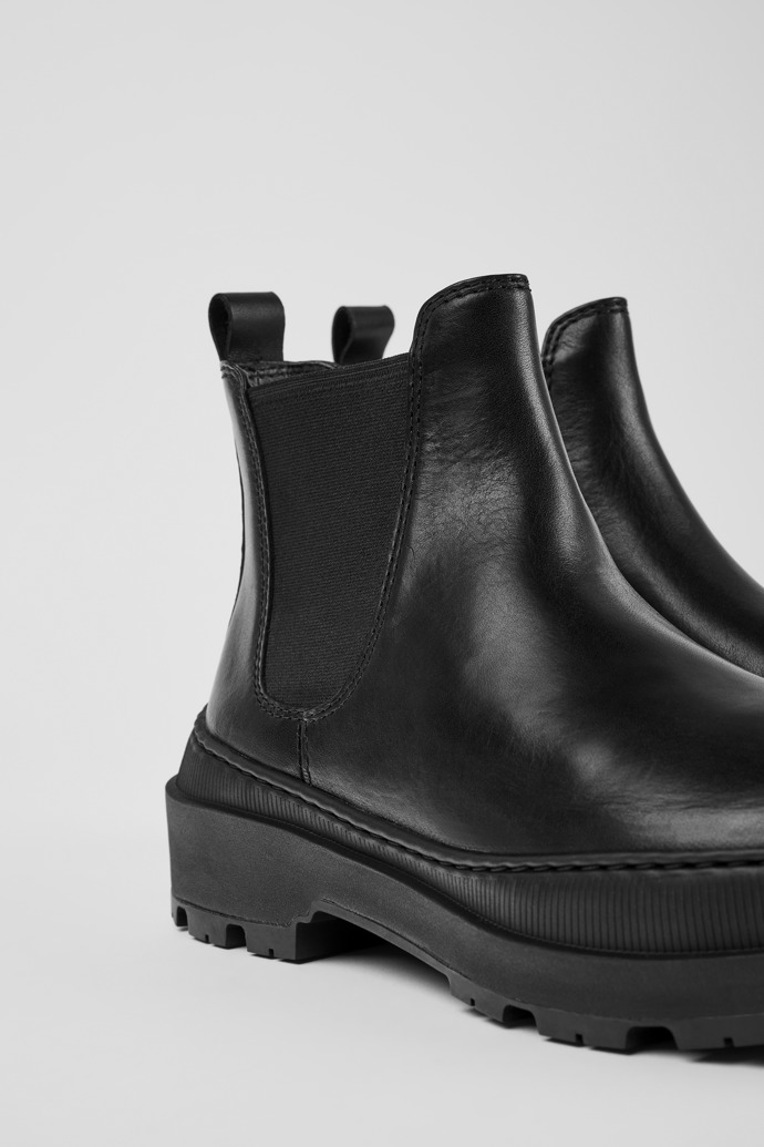 Close-up view of Brutus Trek Black leather ankle boots