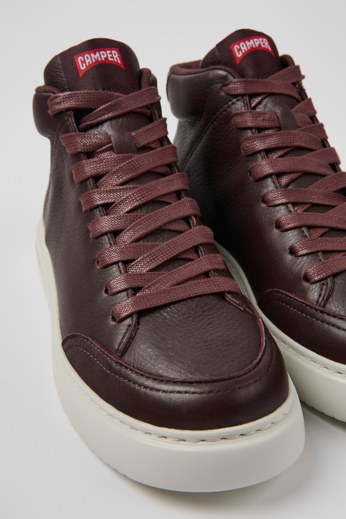 Close-up view of Runner K21 Burgundy leather sneakers for women