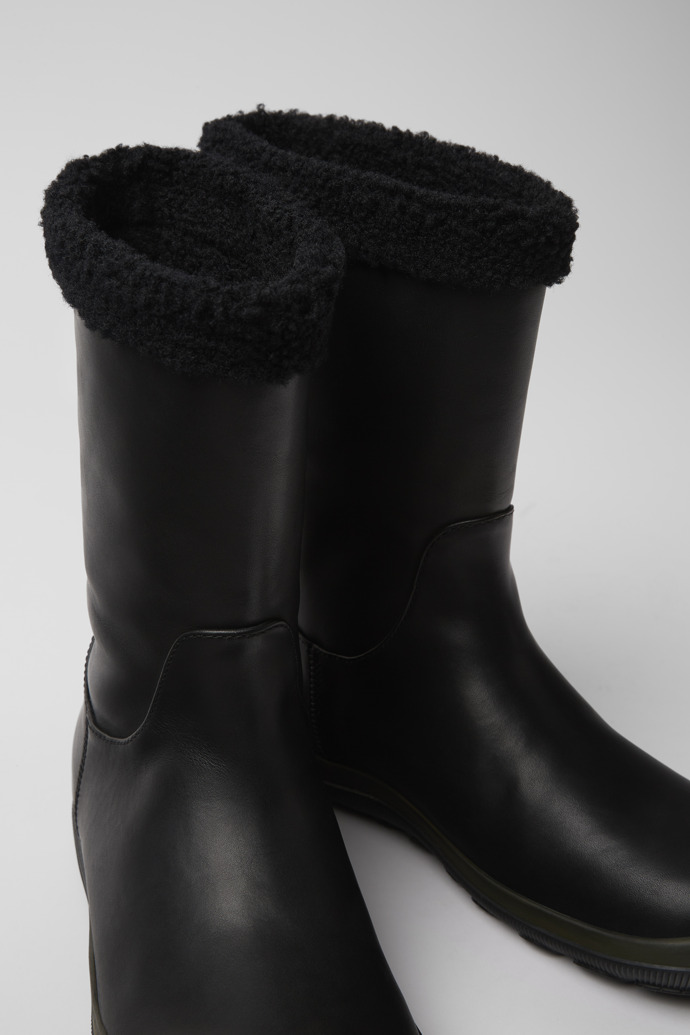 Close-up view of Peu Pista Black leather boots for women