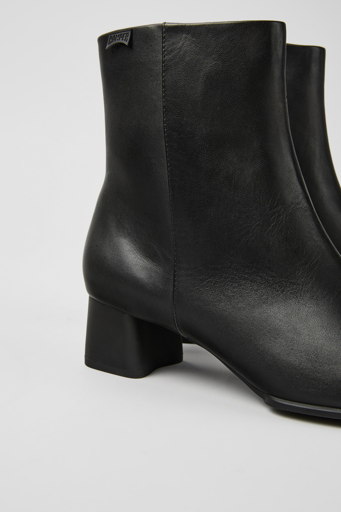 Close-up view of Katie Black leather ankle boots