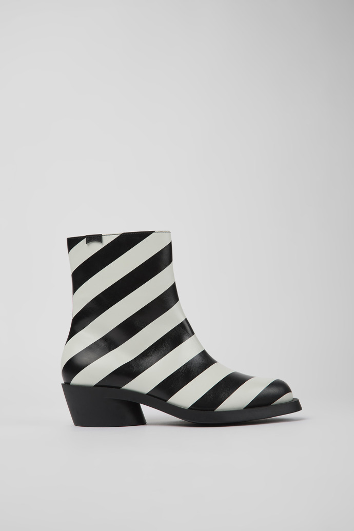 Side view of Bonnie Black and white striped leather boots for women