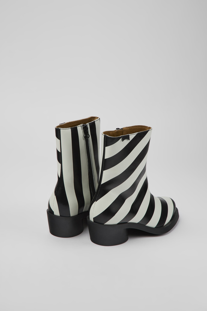 Back view of Bonnie Black and white striped leather boots for women