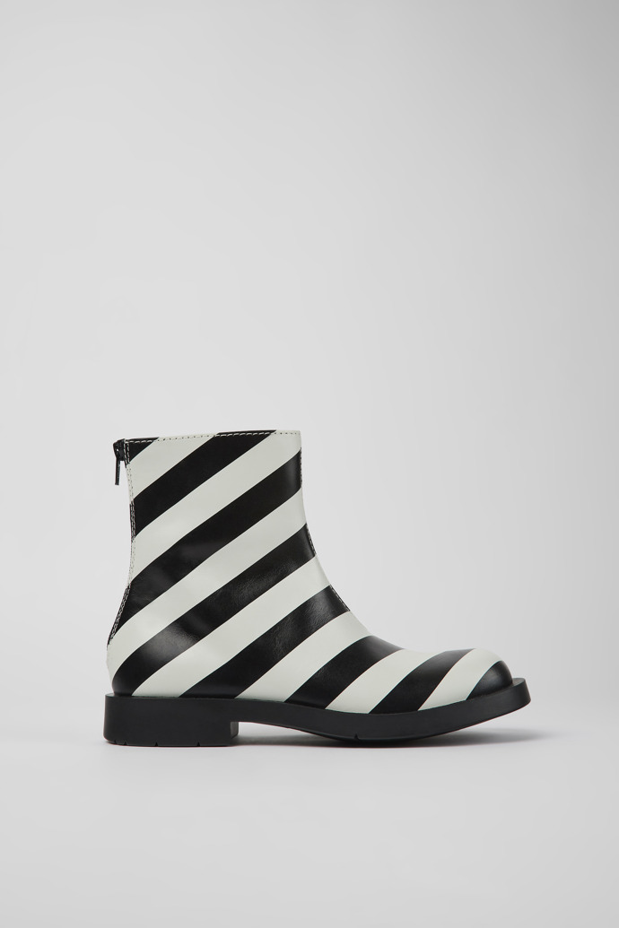 Image of Side view of MIL 1978 Black and white leather ankle boots for women