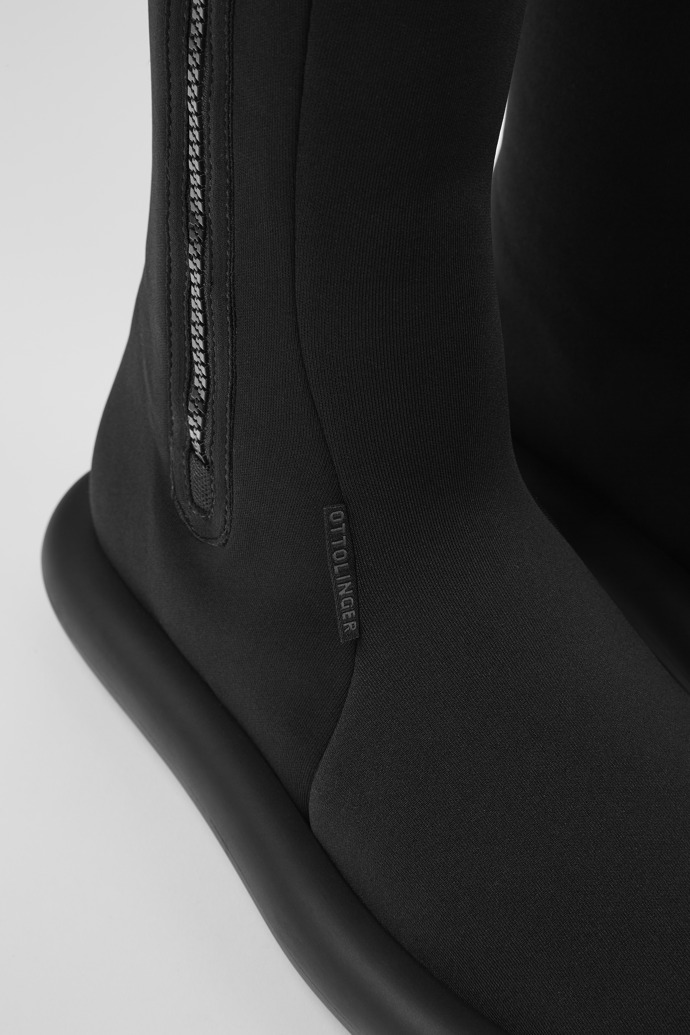 Close-up view of Ottolinger Black boots for women by Camper x Ottolinger