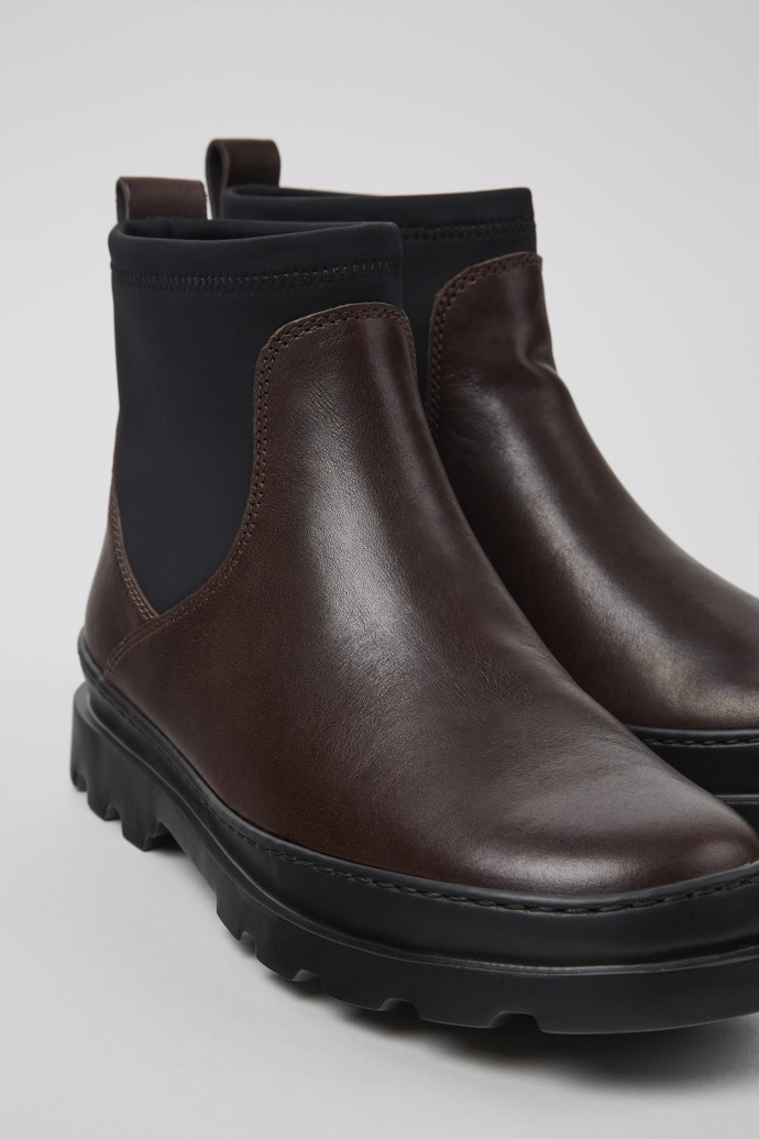 Close-up view of Brutus Brown leather and textile ankle boots for women