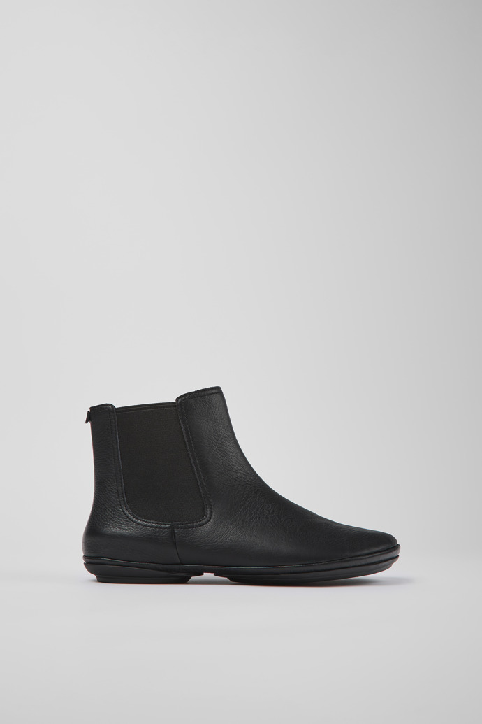 Side view of Right Black leather ankle boots