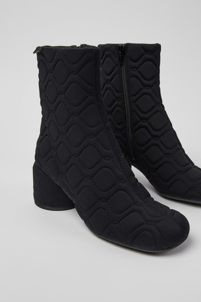 Close-up view of Niki Black textile boots for women