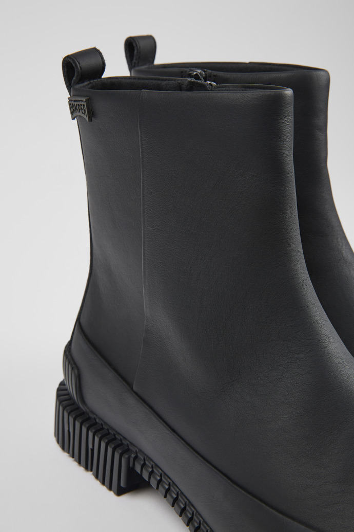 Close-up view of Pix Black leather boots for women