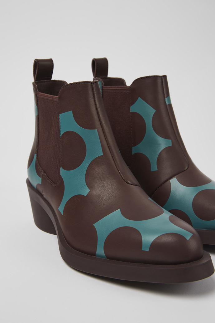 Close-up view of Twins Burgundy and blue leather ankle boots for women