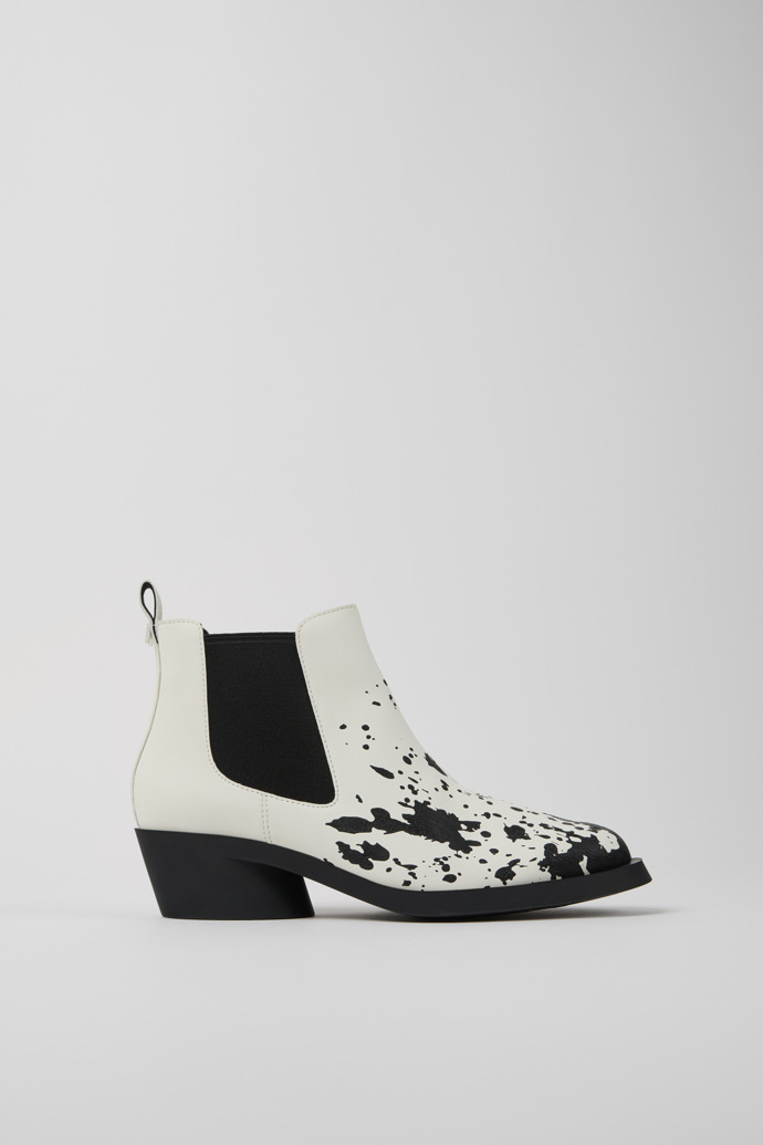 Side view of Bonnie White and black leather ankle boots for women