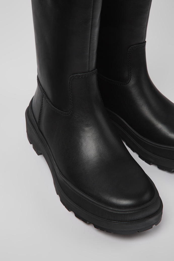 Close-up view of Brutus Trek Black leather boots for women