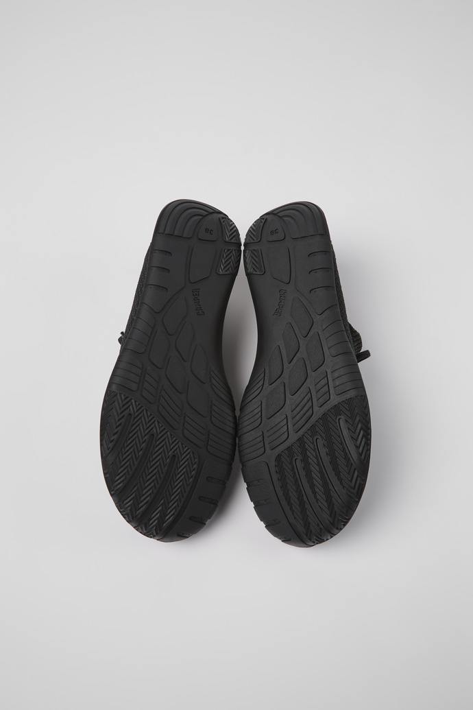 The soles of Path Black textile sneakers for women