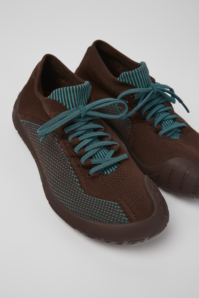 Close-up view of Path Burgundy textile sneakers for women