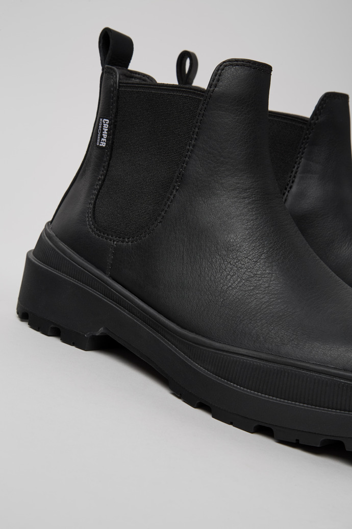 Close-up view of Brutus Trek HYDROSHIELD® Black leather ankle boots for women