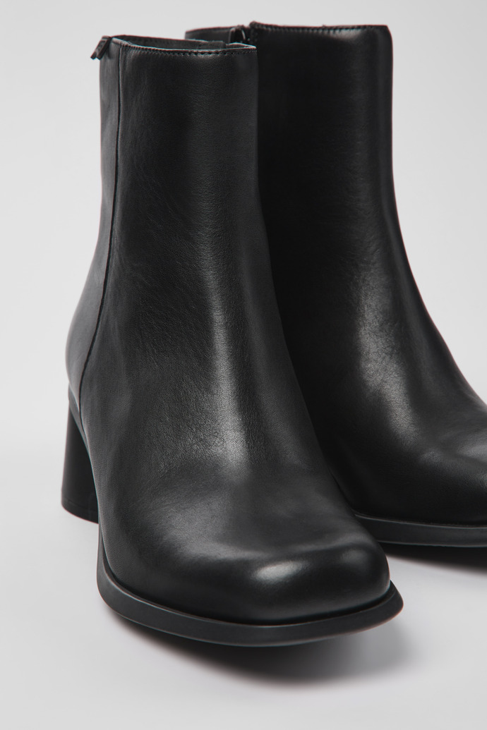 Close-up view of Kiara Black leather and recycled PET boots for women