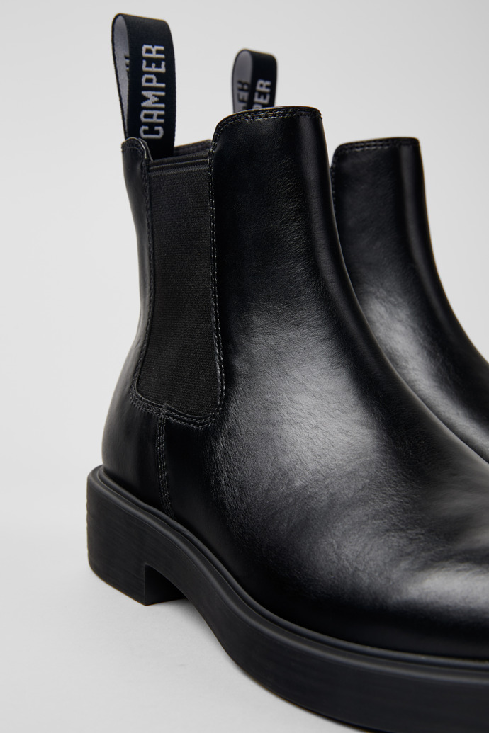 Close-up view of Dean Black leather ankle boots for women