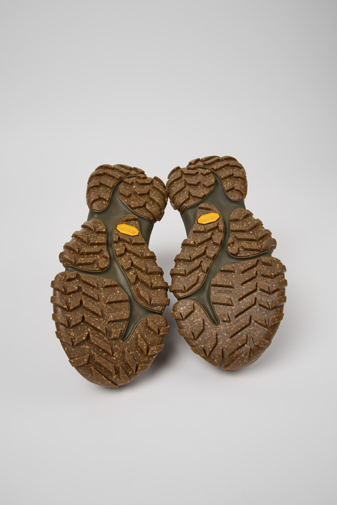 The soles of Karst Trek - GORE-TEX Green Textile and Nubuck Ankle Boots for Women.