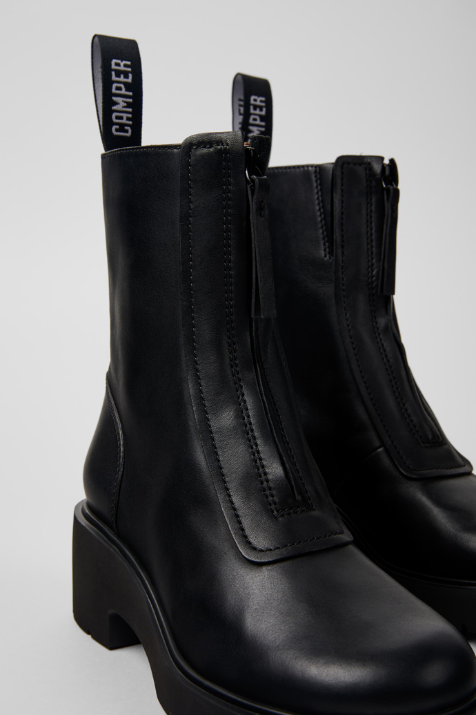 Close-up view of Milah Black leather zip boots for women