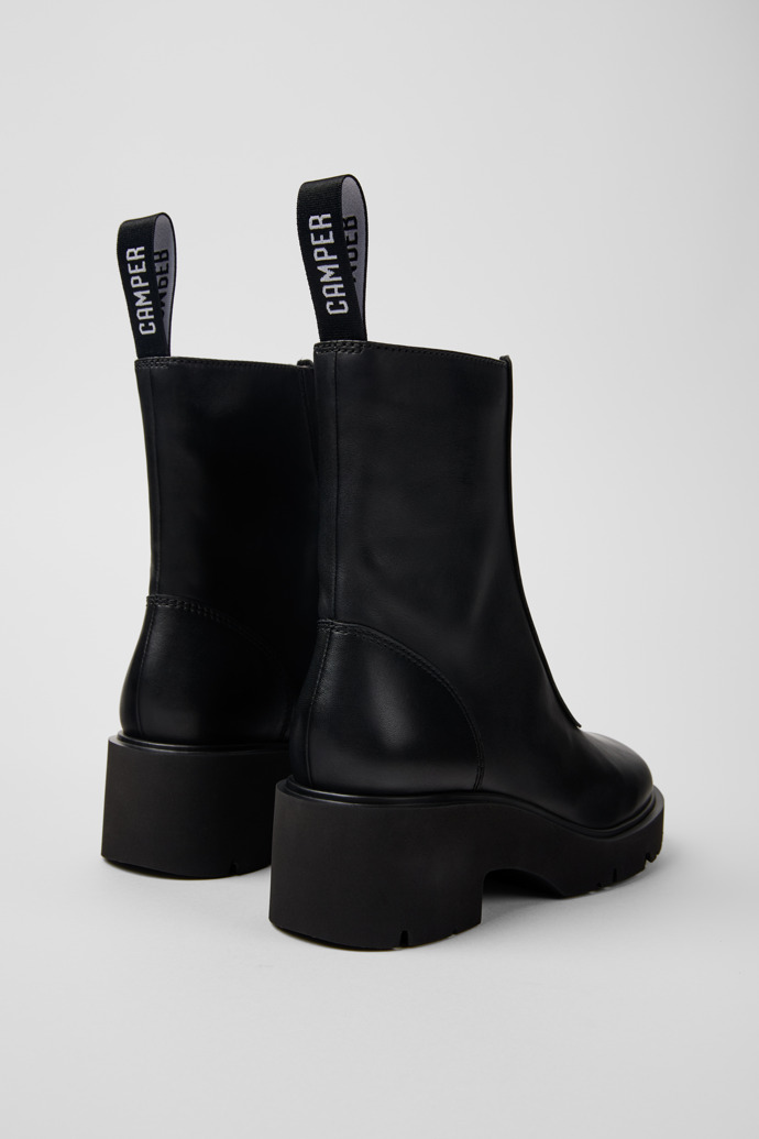 Back view of Milah Black leather zip boots for women