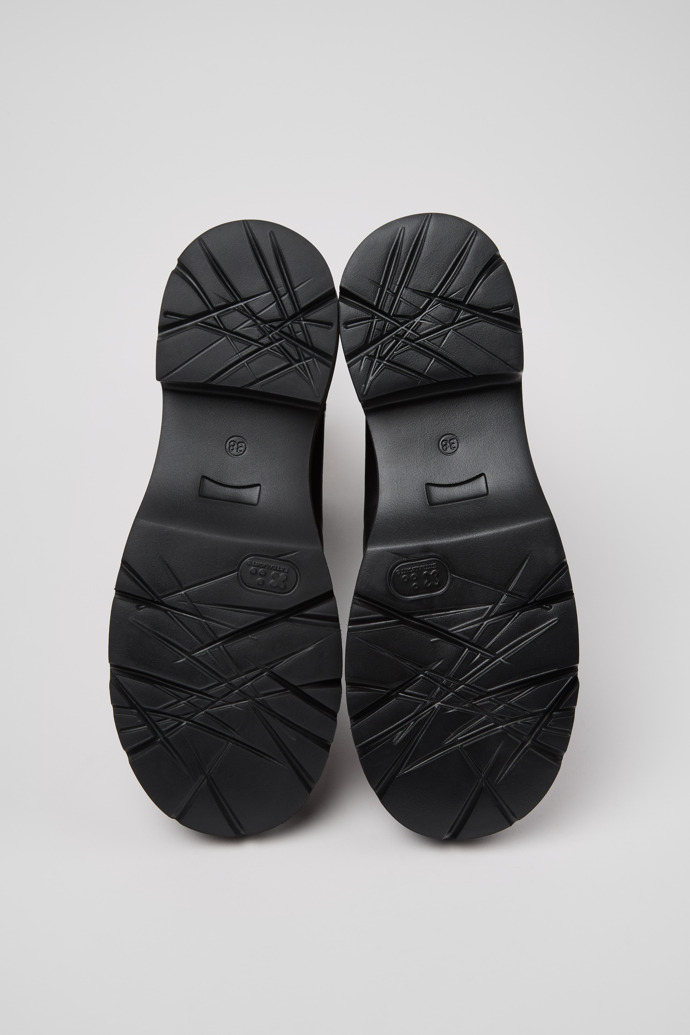 The soles of Milah Black and Pink Leather Mid Boots for Women.
