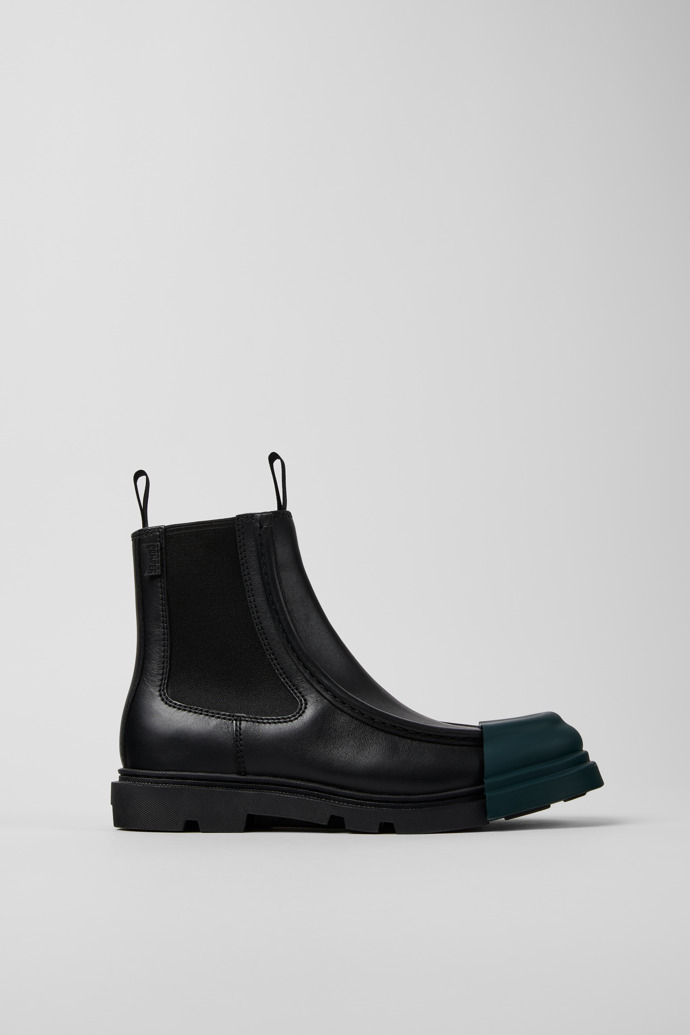 Side view of Junction Black leather chelsea boots for women