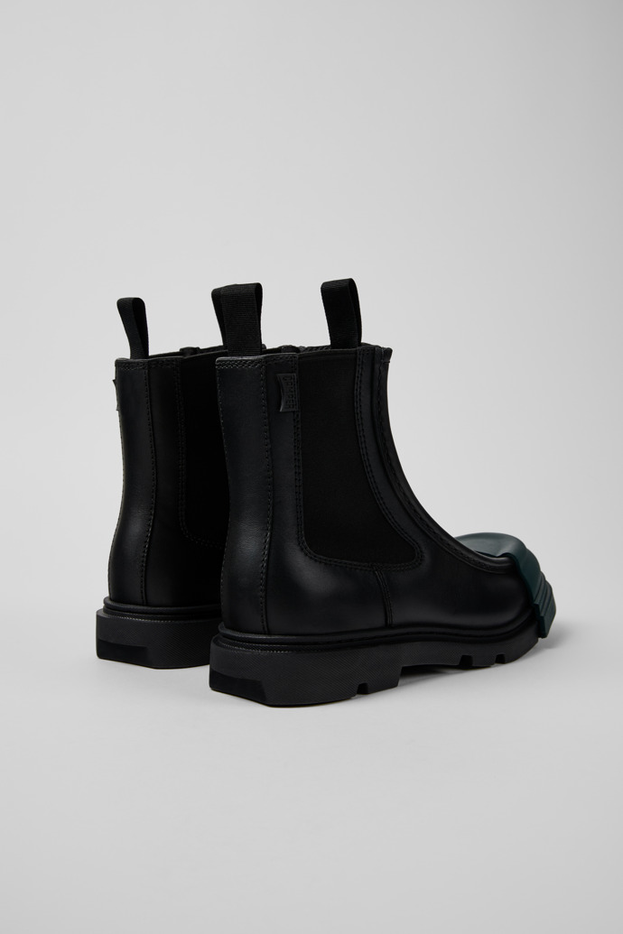 Back view of Junction Black leather chelsea boots for women