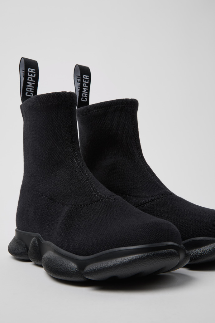 Close-up view of Karst Black TENCEL® Lyocell Women's Mid Boots.