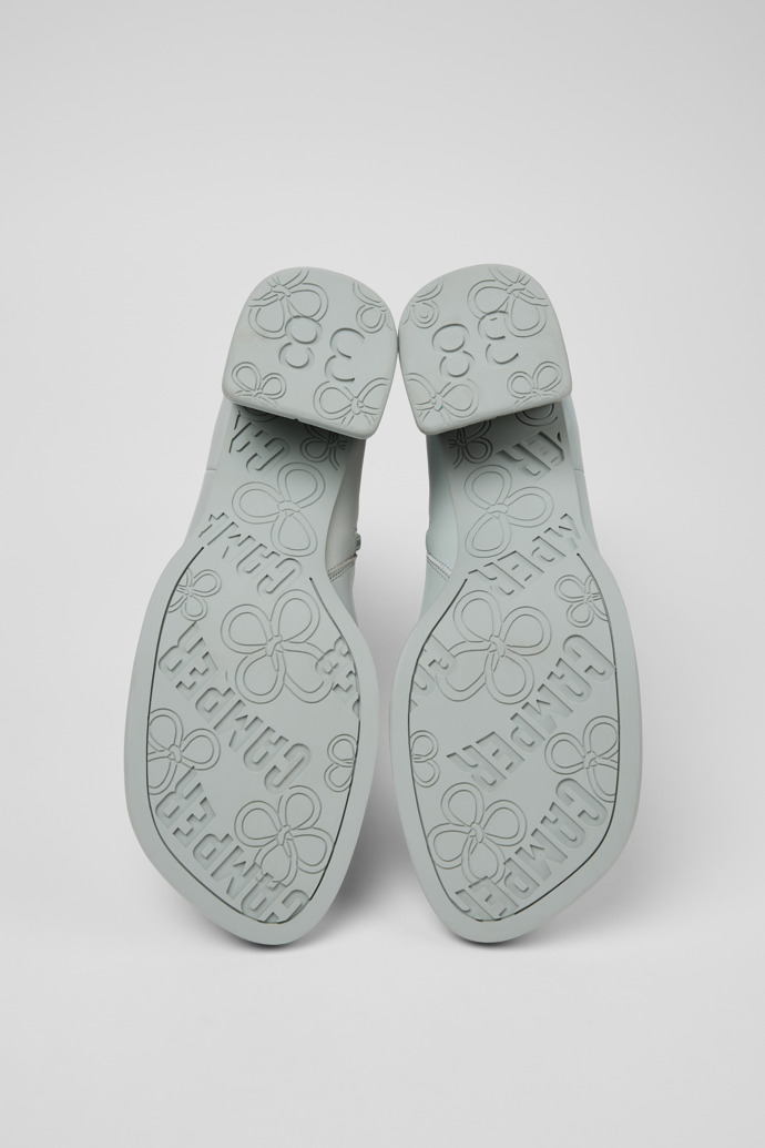 The soles of Kora Gray Leather Mid Boots for Women.