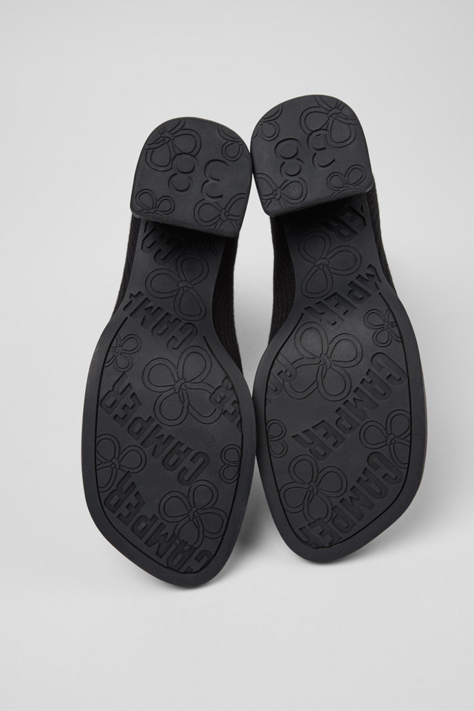 The soles of Kora - TENCEL Black TENCEL™ Lyocell Mid Boots for Women.