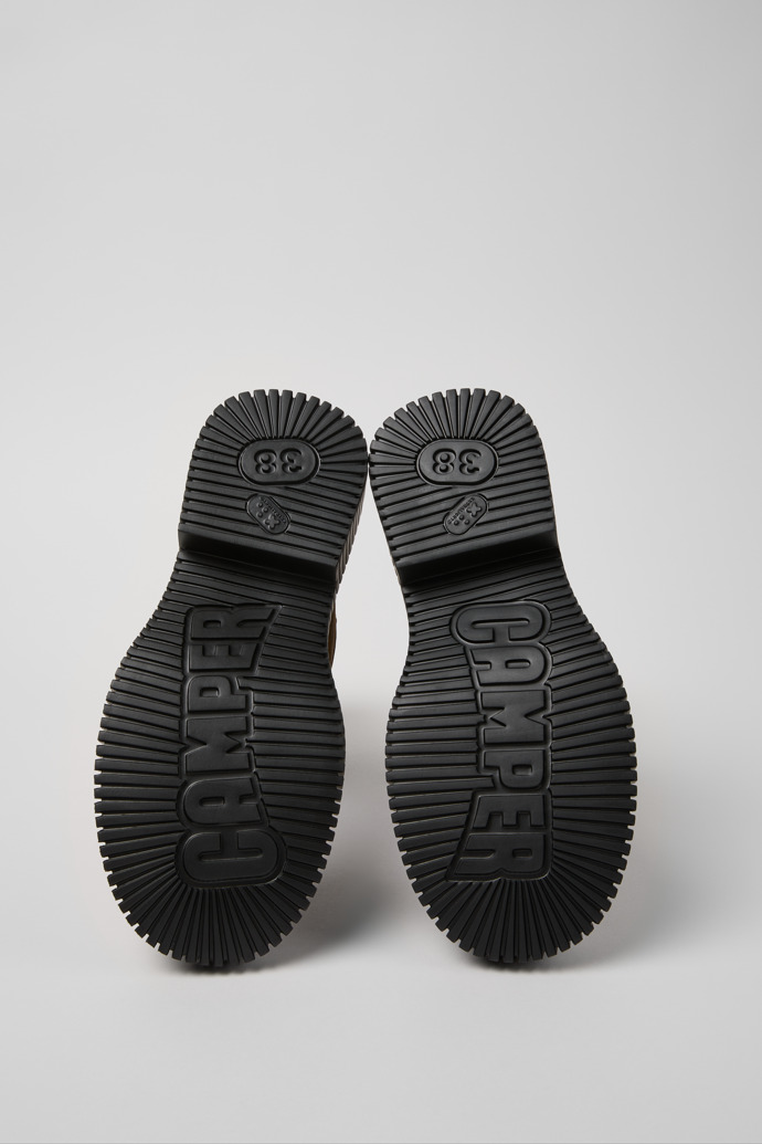 The soles of Pix Berlin Brown Nubuck Mid Boots for Women.