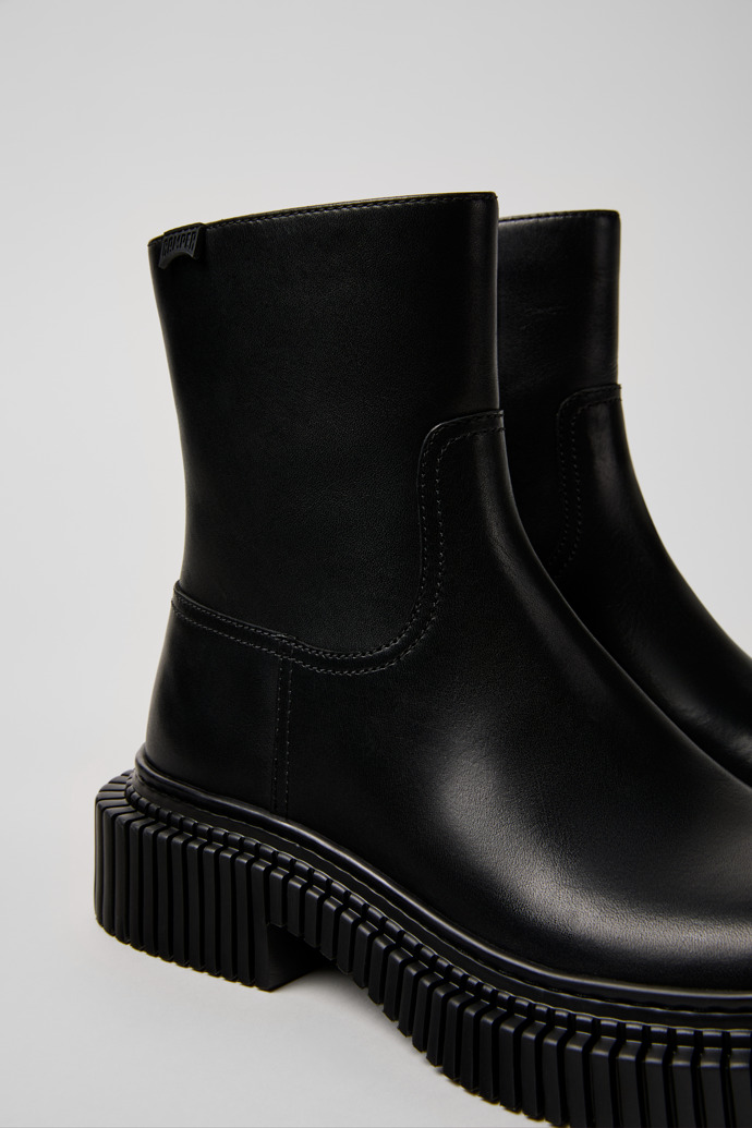 Close-up view of Pix Berlin Black Leather Mid Boots for Women.