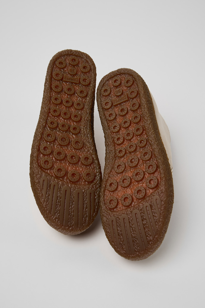 The soles of Peu Terreno Beige Suede Ankle Boots for Women.