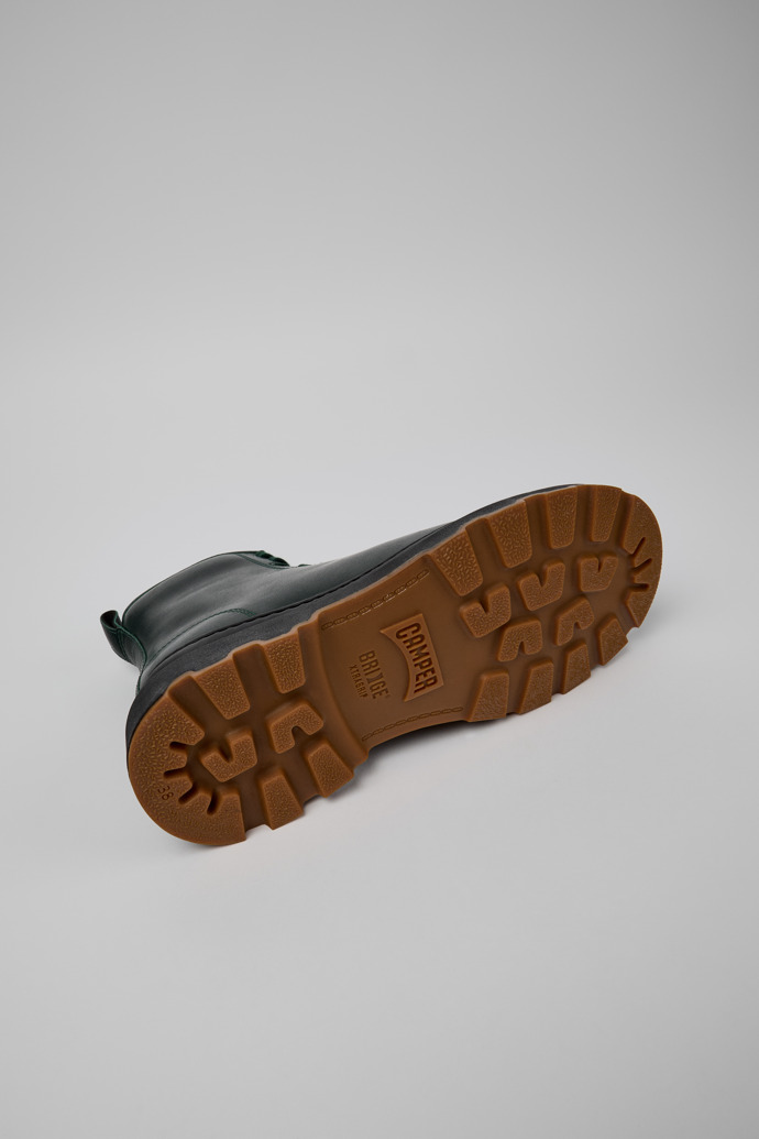 The soles of Brutus+ Green Leather Mid Boots for Women.