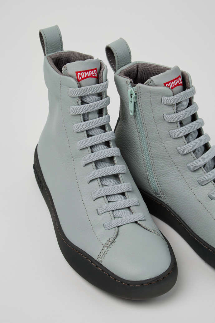 Close-up view of Peu Touring Gray Leather Mid Boots for Women.
