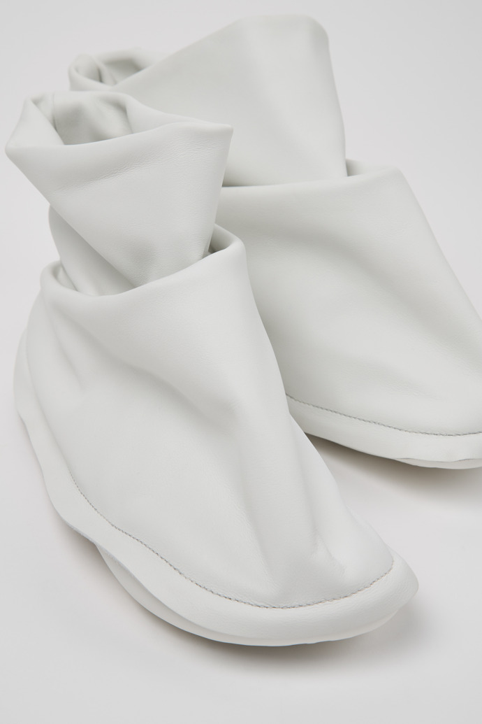 Close-up view of Camper x ISSEY MIYAKE - Peu Form White Leather Ankle Boots for Women.