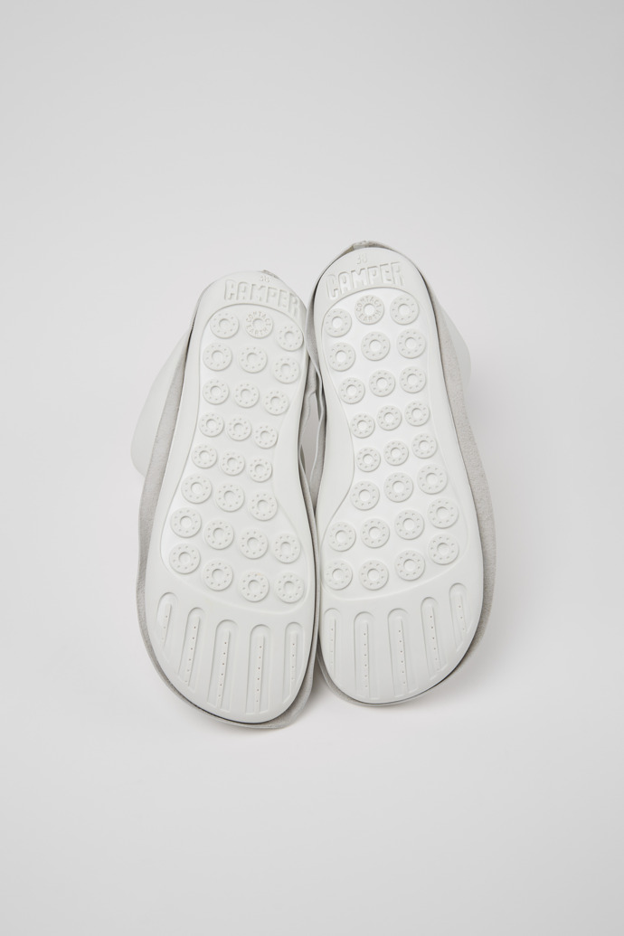 The soles of Camper x ISSEY MIYAKE - Peu Form White Leather Ankle Boots for Women.