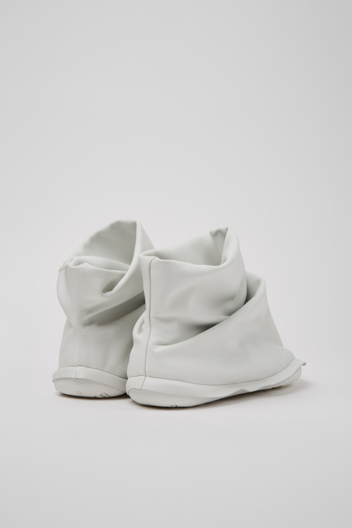 Back view of Camper x ISSEY MIYAKE - Peu Form White Leather Ankle Boots for Women.